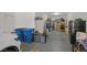 Cluttered garage view with a parked car and an abundance of storage at 404 Lost Horizon Ave, Henderson, NV 89002