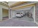 Garage with a parked car and storage at 404 Lost Horizon Ave, Henderson, NV 89002