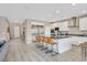 Modern kitchen boasting a large island with bar seating, stainless steel appliances, and ample cabinetry at 404 Lost Horizon Ave, Henderson, NV 89002