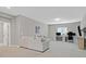 Spacious living room with a sofa, desk, and TV, creating a versatile space at 404 Lost Horizon Ave, Henderson, NV 89002