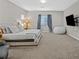 Large bedroom with ample space, a big bed, and natural light from a window at 404 Lost Horizon Ave, Henderson, NV 89002