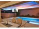 Outdoor patio and pool at twilight at 404 Lost Horizon Ave, Henderson, NV 89002