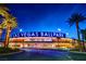 Las Vegas Ballpark illuminated at night, surrounded by palm trees, creating a vibrant and inviting atmosphere at 421 Malpaso St, Las Vegas, NV 89138