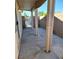This backyard has a concrete patio with a covered awning at 4718 Victoria Garden Ave, North Las Vegas, NV 89031