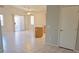 Open living room with sliding glass door and views into the kitchen at 4718 Victoria Garden Ave, North Las Vegas, NV 89031