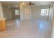 Open-concept living room with tile flooring and natural light at 4718 Victoria Garden Ave, North Las Vegas, NV 89031