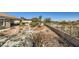 Backyard with xeriscape landscaping, creating a beautiful and drought-tolerant outdoor space at 4750 Fiore Bella Blvd, Las Vegas, NV 89135