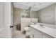 Bathroom with walk-in shower, toilet, vanity, tile floors, and light walls at 5008 Shoal Creek Cir, Las Vegas, NV 89113
