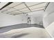 Spacious garage featuring storage cabinets, utility sink, and high ceilings at 5008 Shoal Creek Cir, Las Vegas, NV 89113