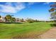 Scenic view of the golf course with lush green fairways and manicured landscaping at 5008 Shoal Creek Cir, Las Vegas, NV 89113