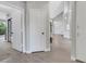 Hallway with tile floors provides access to the bedroom, bathroom, and kitchen at 5008 Shoal Creek Cir, Las Vegas, NV 89113