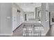 Beautiful kitchen with long countertops, breakfast bar seating, and ample cabinet space and appliances at 5008 Shoal Creek Cir, Las Vegas, NV 89113