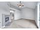 Bright living room with fireplace and glass doors at 5008 Shoal Creek Cir, Las Vegas, NV 89113