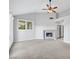 Bright living room features vaulted ceilings and fireplace at 5008 Shoal Creek Cir, Las Vegas, NV 89113