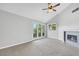 Bright living room features vaulted ceilings, fireplace and glass doors to the backyard at 5008 Shoal Creek Cir, Las Vegas, NV 89113