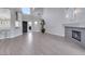 Open floor plan connecting living room, kitchen, and entrance, filled with natural light at 5008 Shoal Creek Cir, Las Vegas, NV 89113