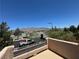 Balcony offers scenic views of the city and mountains in the background at 5052 Whistling Acres Ave, Las Vegas, NV 89131