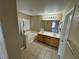 Full bathroom with a soaking tub, step-in shower, double sinks, and tile flooring at 5052 Whistling Acres Ave, Las Vegas, NV 89131