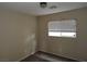 Neutral bedroom with carpeted floor, bright window and base trim throughout at 5052 Whistling Acres Ave, Las Vegas, NV 89131