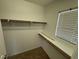 Walk-in closet with shelving at 5052 Whistling Acres Ave, Las Vegas, NV 89131