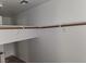 Walk-in closet featuring shelving with rods for organizing clothes at 5052 Whistling Acres Ave, Las Vegas, NV 89131