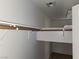 Walk-in closet featuring a closet rod and shelf with white walls and carpeting at 5052 Whistling Acres Ave, Las Vegas, NV 89131