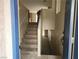 Entryway with a view of the stairs leading to the second floor at 5052 Whistling Acres Ave, Las Vegas, NV 89131