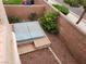 An above ground hot tub is nestled in a quaint walled-in section of the back yard at 5052 Whistling Acres Ave, Las Vegas, NV 89131