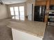 Kitchen featuring granite countertops, stainless steel appliances, and ample cabinet space at 5052 Whistling Acres Ave, Las Vegas, NV 89131