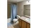 Bathroom featuring a shower-tub, granite vanity, and tile floor at 5055 W Hacienda Ave # 2102, Las Vegas, NV 89118