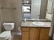 Bathroom featuring neutral paint, a vanity with ample storage, and a well-lit mirror at 5055 W Hacienda Ave # 2102, Las Vegas, NV 89118