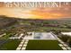 Enjoy backyard views featuring a pool, spa, fire pit, and putting green, with a golf course and mountain backdrop at 515 Serenity Point Dr, Henderson, NV 89012