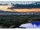 Enjoy Las Vegas city views from the backyard while relaxing poolside in this luxury backyard at 515 Serenity Point Dr, Henderson, NV 89012