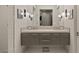 Bright bathroom with dual sinks and a sleek floating vanity at 515 Serenity Point Dr, Henderson, NV 89012