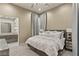 Cozy bedroom with large bed and an en-suite bathroom view at 515 Serenity Point Dr, Henderson, NV 89012