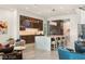 Gourmet kitchen with a spacious island and custom built-in bar area perfect for entertaining Gathering and friends at 515 Serenity Point Dr, Henderson, NV 89012