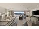 Spacious living room with plush seating, scenic views, and contemporary decor elements at 515 Serenity Point Dr, Henderson, NV 89012