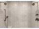 Modern shower featuring dual shower heads and sleek tile work at 515 Serenity Point Dr, Henderson, NV 89012