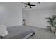 Bright bedroom with a ceiling fan and neutral decor at 520 Blackbird Knoll Ct, North Las Vegas, NV 89084