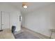 Bright, modern office space with light wood-look floors, closet and neutral palette at 520 Blackbird Knoll Ct, North Las Vegas, NV 89084
