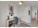 Bright and airy office space with door to bathroom, closet, and neutral palette at 520 Blackbird Knoll Ct, North Las Vegas, NV 89084
