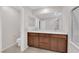 Bathroom with double sink vanity, and glass enclosed shower at 5503 Jinan St, Las Vegas, NV 89148