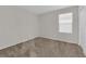 Bedroom featuring a window with horizontal blinds at 5503 Jinan St, Las Vegas, NV 89148