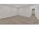 A spacious bedroom featuring neutral paint and carpet for a modern, minimalist design at 5503 Jinan St, Las Vegas, NV 89148