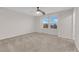 Bedroom with ceiling fan, and a window with natural light at 5503 Jinan St, Las Vegas, NV 89148