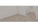 Simple bedroom with neutral paint, tile floors, and large closet at 5503 Jinan St, Las Vegas, NV 89148