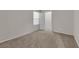 Bedroom with neutral walls, window with blinds, and carpet at 5503 Jinan St, Las Vegas, NV 89148