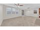 Bright living room with natural light, tile floors, and dining area at 5503 Jinan St, Las Vegas, NV 89148