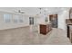 Spacious living room featuring neutral tile floors and ample natural light at 5503 Jinan St, Las Vegas, NV 89148