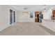 Bright living room with natural light, tile floors, and dining area at 5503 Jinan St, Las Vegas, NV 89148